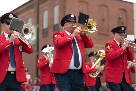 Holland, Michigan, USA - May 12, 2018 Members of the Holland American Legion Band, Established - 1920 perform at the Muziek Parade, during the Tulip Time Festival