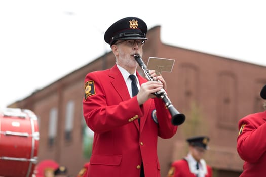 Holland, Michigan, USA - May 12, 2018 Members of the Holland American Legion Band, Established - 1920 perform at the Muziek Parade, during the Tulip Time Festival