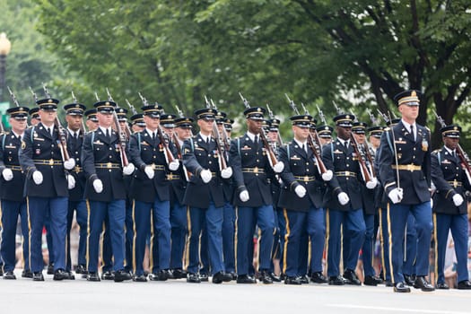 Washington, D.C., USA - July 4, 2018, Members of the US Army carrying rifles marching at the National Independence Day Parade