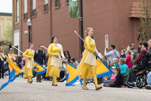 Holland, Michigan, USA - May 12, 2018 Members Columbia Central H.S. Golden Eagles Marching Band at the Muziek Parade, during the Tulip Time Festival