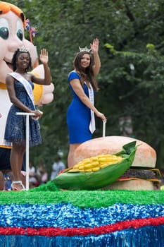 Washington, D.C., USA - July 4, 2018, The National Independence Day Parade, Group of beauty queens on a float going down constitution avenue