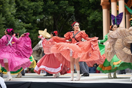 Matamoros, Tamaulipas, Mexico - November 20, 2018: The November 20 Festival, Young men and women wearing traditional mexican clothing, perform traditional mexican dances at the Plaza Miguel Hidalgo.