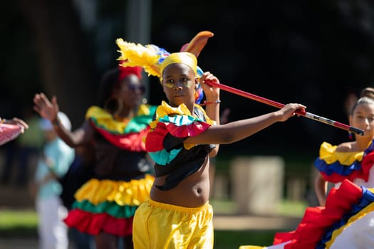 Washington, D.C., USA - September 29, 2018: The Fiesta DC Parade, Colombian boy wearing traditional clothing dancing