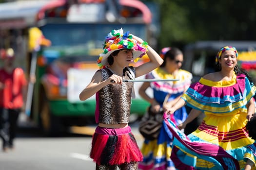 Washington, D.C., USA - September 29, 2018: The Fiesta DC Parade, Colombian boy wearing traditional clothing dancing