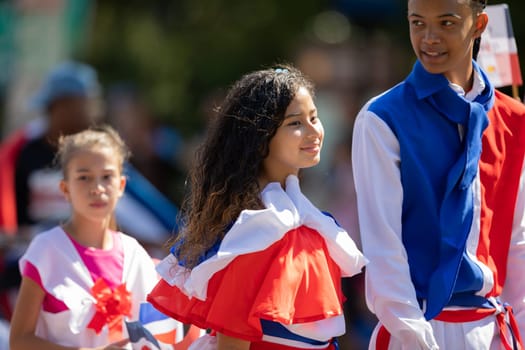 Washington, D.C., USA - September 29, 2018: The Fiesta DC Parade, Woman wearing traditional clothing from the Dominican Republic