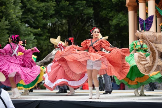 Matamoros, Tamaulipas, Mexico - November 20, 2018: The November 20 Festival, Young men and women wearing traditional mexican clothing, perform traditional mexican dances at the Plaza Miguel Hidalgo.