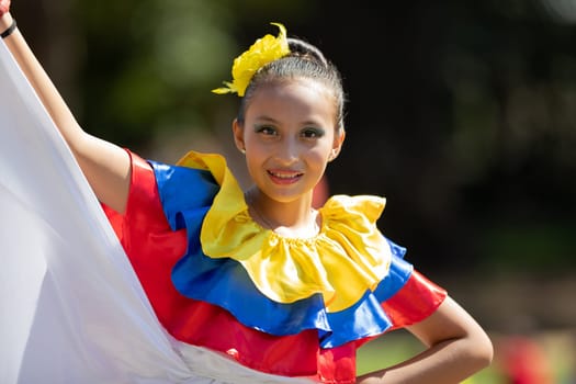 Washington, D.C., USA - September 29, 2018: The Fiesta DC Parade, Young women wearing traditional ecuadorian clothing dancing
