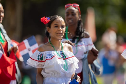 Washington, D.C., USA - September 29, 2018: The Fiesta DC Parade, Woman wearing traditional clothing from the Dominican Republic