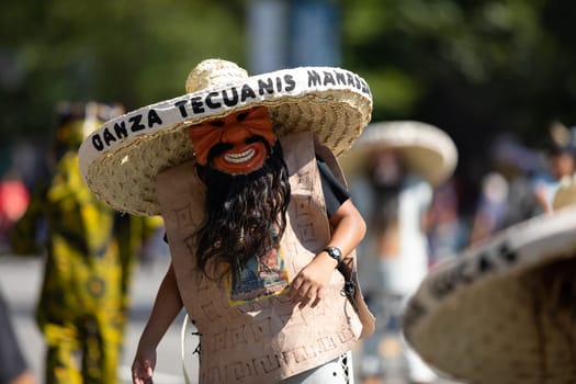 Washington, D.C., USA - September 29, 2018: The Fiesta DC Parade, Mexican man wearing an abstract face mask and a big sombrero