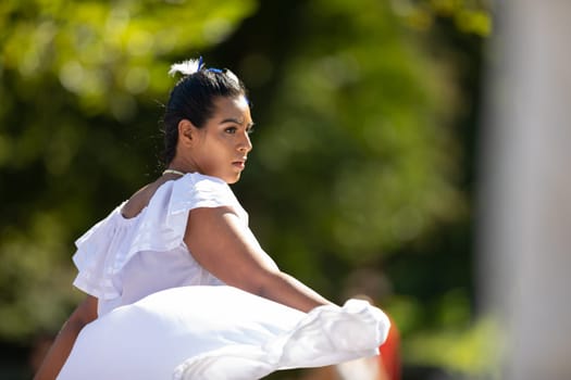 Washington, D.C., USA - September 29, 2018: The Fiesta DC Parade, Woman wearing traditional clothing from Nicaragua dancing