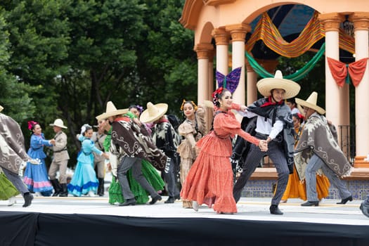 Matamoros, Tamaulipas, Mexico - November 20, 2018: The November 20 Festival, Young men and women wearing traditional mexican clothing, perform traditional mexican dances at the Plaza Miguel Hidalgo.
