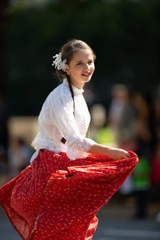 Washington, D.C., USA - September 29, 2018: The Fiesta DC Parade, Woman wearing traditional Panamanian clothing dancing