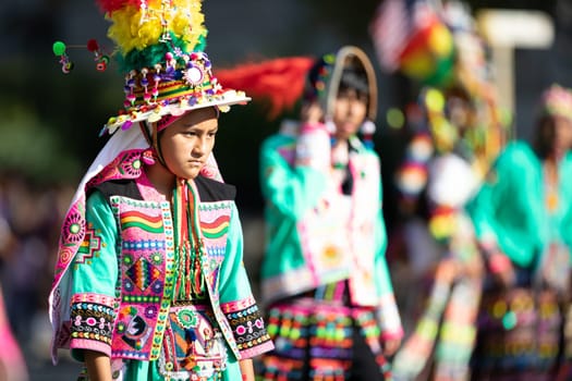 Washington, D.C., USA - September 29, 2018: The Fiesta DC Parade, bolivian woman wearing traditional clothing walking down the street