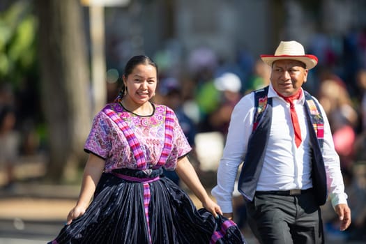 Washington, D.C., USA - September 29, 2018: The Fiesta DC Parade, Man and woman from guatemala wearing traditional guatemalan clothing