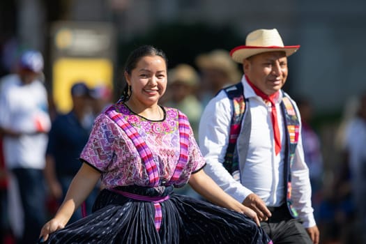 Washington, D.C., USA - September 29, 2018: The Fiesta DC Parade, Man and woman from guatemala wearing traditional guatemalan clothing