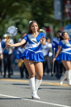 Washington, D.C., USA - September 29, 2018: The Fiesta DC Parade, Cheerleaders from the Angeles de Paz from el salvador, dancing at the parade
