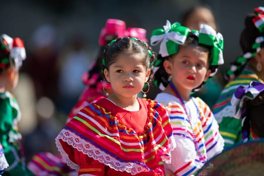 Washington, D.C., USA - September 29, 2018: The Fiesta DC Parade, Mexican children on top of a float wearing traditional mexican clothing