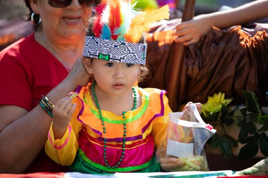 Washington, D.C., USA - September 29, 2018: The Fiesta DC Parade, peruvian child wearing traditional clothing on a float
