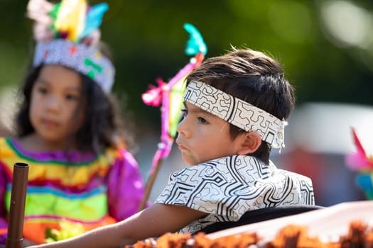 Washington, D.C., USA - September 29, 2018: The Fiesta DC Parade, peruvian child wearing traditional clothing on a float