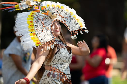 Washington, D.C., USA - September 29, 2018: The Fiesta DC Parade, peruvian woman wearing traditional clothing danicng during the parade