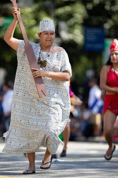 Washington, D.C., USA - September 29, 2018: The Fiesta DC Parade, peruvian man wearing traditional clothing danicng during the parade