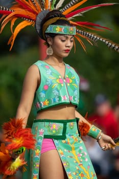 Milwaukee, Wisconsin, USA - September 8, 2018 The Indian Summer Festival: Men women and children members of the Dance Academy of Mexico performing Aztec Dance