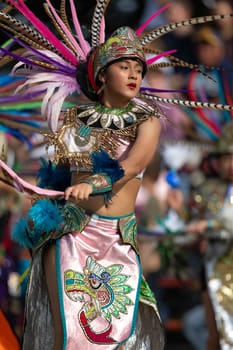 Milwaukee, Wisconsin, USA - September 8, 2018 The Indian Summer Festival: Men women and children members of the Dance Academy of Mexico performing Aztec Dance