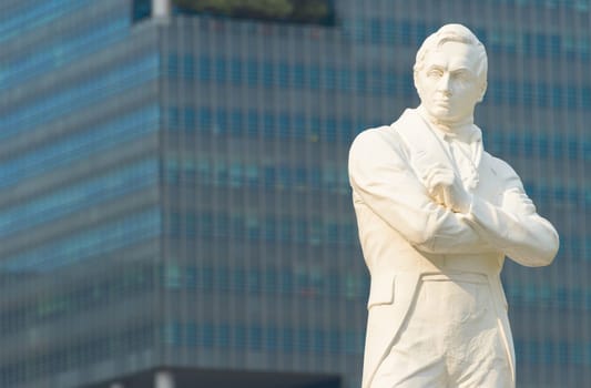 Closeup of white marble statue of Sir Stamford Raffles, founder of modern Singapore