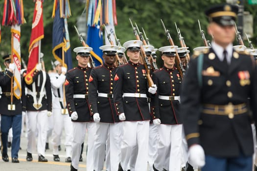 Washington, D.C., USA - May 28, 2018: The National Memorial Day Parade, Members of the United States Marine Corps marching down Constitution Avenue