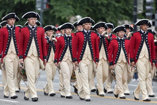Washington, D.C., USA - May 28, 2018: The National Memorial Day Parade, Members of The U.S. Army Old Guard Fife and Drum Corps, marching down Constitution Avenue