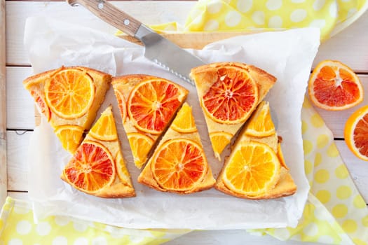 Fruity sponge cake with fresh candied oranges