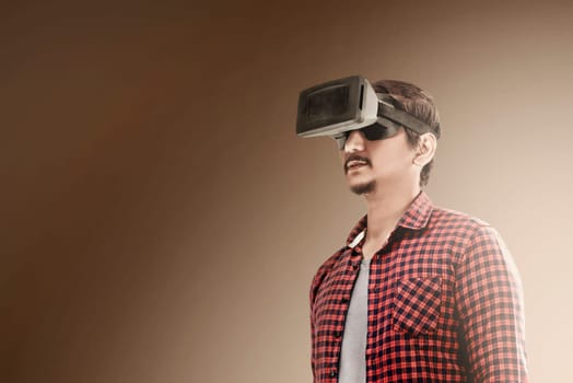 Asian man using virtual reality device. Augmented reality technology