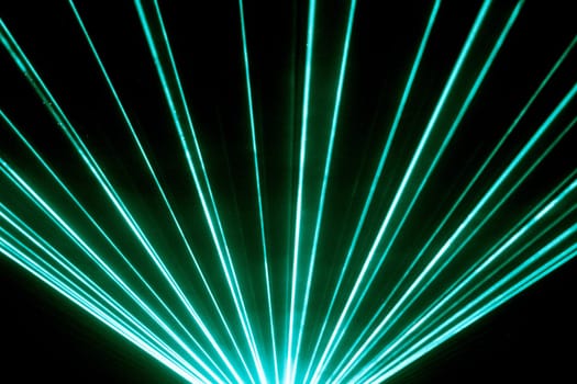 Luxury entertainment in nightclub event, festival, concert or New Years Eve. Ray beams are symbol for science and universe research.