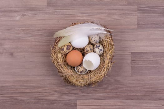 Beautiful decoration easternest with quail egg and feather for holiday celebration in april. Handmade tinker luxury design bouquet.