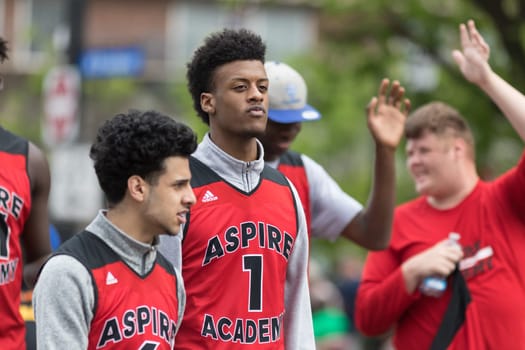 Louisville, Kentucky, USA - May 03, 2018: The Pegasus Parade, Students from Aspire Academy, in uniforms walking down W Broadway