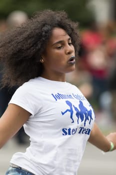 Louisville, Kentucky, USA - May 03, 2018: The Pegasus Parade, Johnson Traditional Middle School Step Team, dancing during the parade