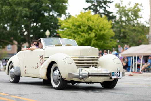 Auburn, Indiana, USA - September 9, 2018 The Auburn Cord Duesenberg Festival, A Cord classic car driving down the street during the parade