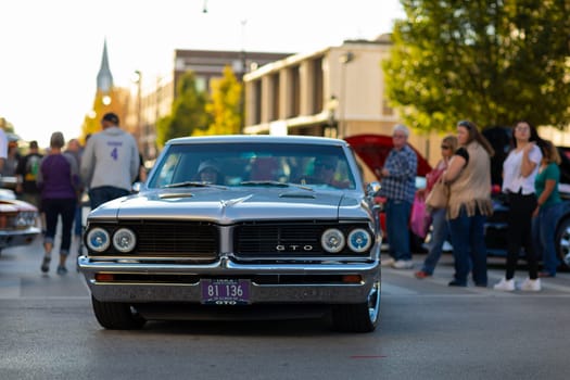 Springfield, Illinois, USA - September 22, 2018: The Route 66 Mother Road Festival, Pontiac GTO being driven on the streets of downtown Springfield