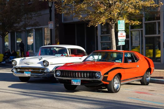Springfield, Illinois, USA - September 22, 2018: The Route 66 Mother Road Festival, AMC Javelin SST, next to a Chevrolet Bel Air, on the streets of downtown Springfield