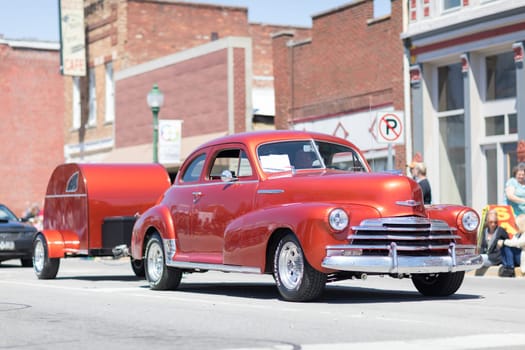 Orleans, Indiana, USA - April 28, 2018: The Orleans DogWood Festival and Parade, A classic car going down the street during the parade a Chevrolet Stylemaster color Red
