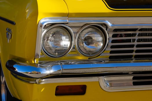 Springfield, Illinois, USA - September 22, 2018: The Route 66 Mother Road Festival, Close up of the front light of a Chevrolet Impala, on the streets of downtown Springfield
