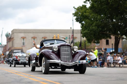 Auburn, Indiana, USA - September 9, 2018 The Auburn Cord Duesenberg Festival, An Auburn classic car driving down the street during the parade