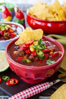 Spicey hot chili con carne with tortilla chips