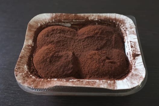 Messy yummy chocolate bun or Chocolate 'dirty' bread  in white box .