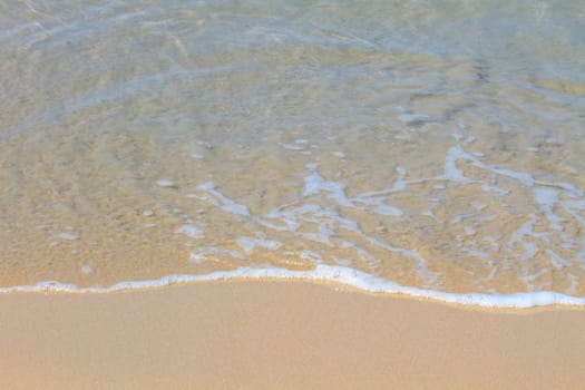 Moving of surf in the sea,Soft wave of the sea on the sandy beach