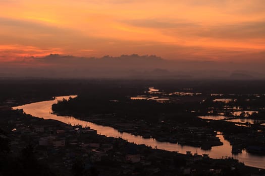 Beautiful fishing villages near mountain and sunset