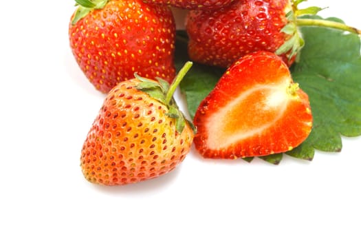 Ripe red strawberries on white background isolated