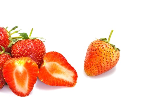 Ripe red strawberries on white background isolated