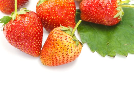 Ripe red strawberries on white background isolated