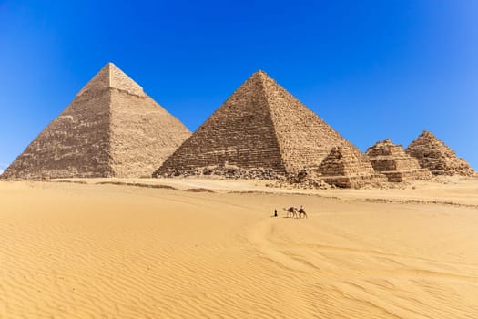 The Pyramids of Giza in the desert of Egypt.